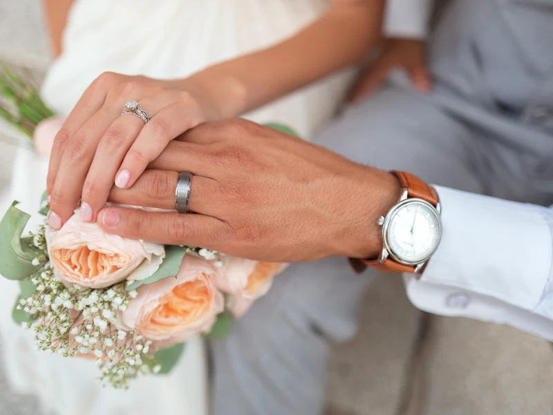 Wedding rings and a bouquet